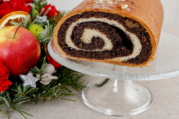 Wall Mural - Festive poppy seed cake and Christmas decorations.