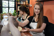 © FotoArtist - Pottery craft master showing her disciple how to make workpieces for earthenware