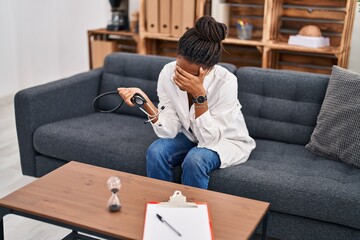 Poster - African american woman doctor patient stressed having psychology session at psychology center