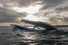 Float Plane Upside Down In Choppy Water During A Storm After A Crash In Bad Weather. 