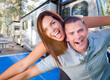 © Andy Dean - Young Adult Military Couple In Front of Their Beautiful RV At The Campground.
