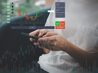 A businessman or trader is pointing to a growing stock of virtual holograms. invest in trading Planning, Analysis, Indicators and Buying and Selling Strategies, Stock Market