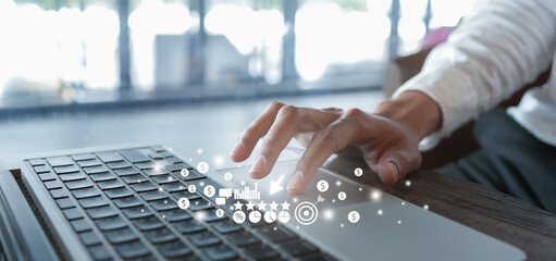 Wall Mural - close up businessman hand click on laptop to use marketing tool and check traffic research of pay pe