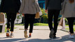 © spoialabrothers - After the lunch time group of charismatic young multiracial ladies and one guy walking to the main business centre and holding some eco shopping bags