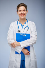 Wall Mural - Smiling doctor woman holding clipboard. isolated female portrait.