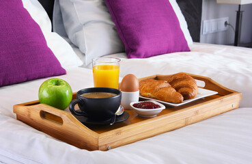 Wall Mural - Breakfast on tray in bed in hotel room