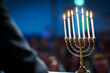 Menorah in room with 7 arms Hanukkah symbol, selective focus