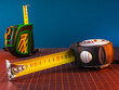 © ProstoSvet - Construction tape measure on the table in the workshop. Analog measuring tool