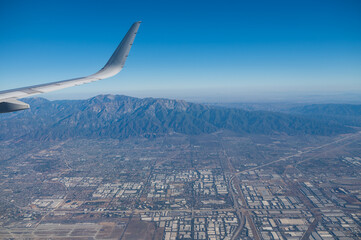 Poster - Airplane wing seen flying over Los Angeles