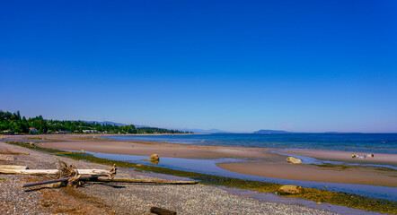 Qualicum Beach, Vancouver Island, BC, on a sunny summer day.