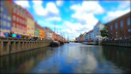 Wall Mural - Artistically blurred edges of Nyhavn Copenhagen canal houses and ships in Denmark HDR tripod view