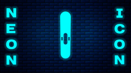 Sticker - Glowing neon Cigar icon isolated on brick wall background. Vector