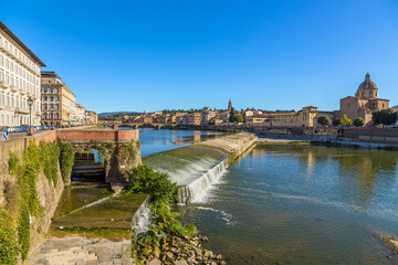 Wall Mural - florence, italy. scenic landscape with a dam
