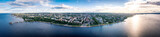 Fototapeta  - Aerial panorama of the embankment of Petrozavodsk., Russia, the administrative center of Republic of Karelia. Sunset on Lake Onega