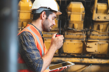 professional industrial engineers in hard hats. working at heavy industry manufacturing factory, man worker in an construction industrial job, maintenance service check for safety first concept