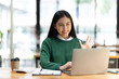 © PaeGAG - Asian woman working with laptop in her office. business financial concept.