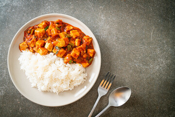 Wall Mural - Mapo Tofu - The traditional Sichuan dish of silken tofu and ground beef, packed with mala flavor from chili oil and Sichuan peppercorns.