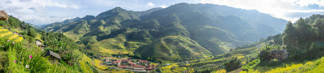 Aerial view of golden rice terraces at Mu cang chai town near Sapa city, north of Vietnam. Beautiful terraced rice field in harvest season in Yen Bai, Vietnam