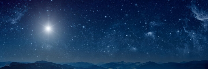 Wall Mural - the star shines on the christmas eve of jesus christ.