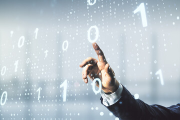 male hand working with abstract virtual binary code sketch on blurred office background, hacking and