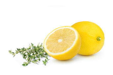 Wall Mural - Fresh thyme sprig herbs with lemon fruit isolated on white background.