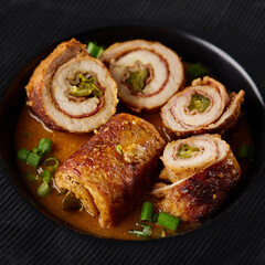 Wall Mural - Pork roulade with pickles and bacon, served with demiglace meat sauce