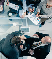 Wall Mural - top view. business team discussing financial issues at a working meeting.