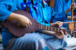 People playing Thai string instrument old traditional music instruments