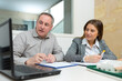 © auremar - two designers having creative meeting in modern office