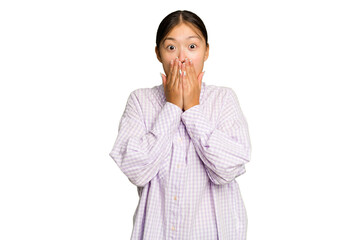 Wall Mural - Young Asian woman isolated on green chroma background shocked covering mouth with hands.