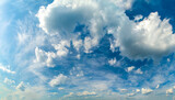 Fototapeta Na sufit - Background with high blue sky and white clouds. Summer sky with cumulus clouds.
