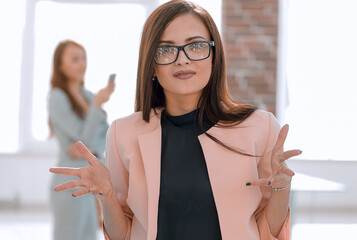 Canvas Print - successful business woman shows a thumb up.