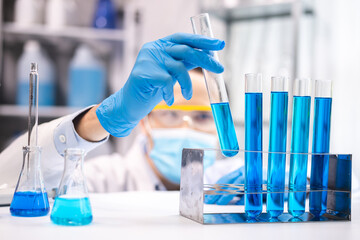 Wall Mural - health care researchers working in life science laboratory, medical science technology research work