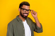 © deagreez - Photo of cheerful attractive man wear khaki shirt arms spectacles smiling isolated yellow color background