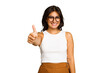 Young Indian woman isolated on green chroma background smiling and raising thumb up