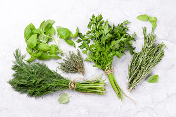 Canvas Print - Various garden herbs on table