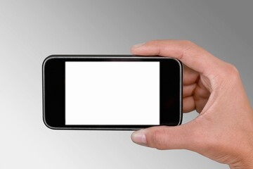 Poster - Hand holding smartphone with blank screen for Infographic Global Business web site design app