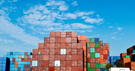 Wall Mural - Stack of cargo containers in harbor