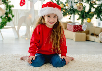 Wall Mural - Child girl in Christmas time