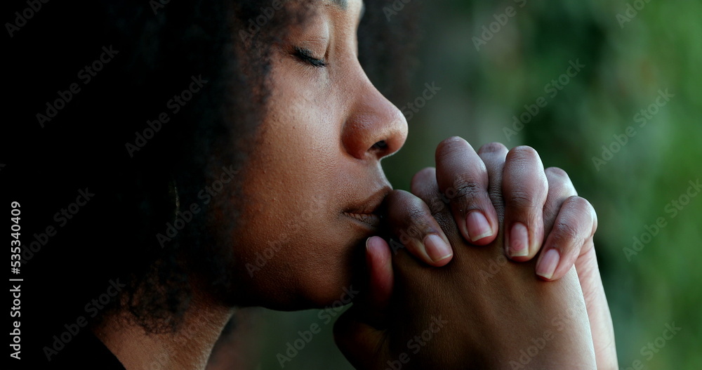 African woman praying to God