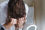 Applying curly method for hair styling