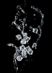 Poster - Freeze motion of flying ice cubes with water splash isolated on black background.