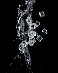 Poster - Freeze motion of flying ice cubes with water splash isolated on black background.