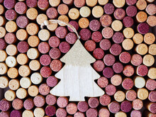 Collection Of Wine Cork From White And Red Wine With Christmas Fir Tree Wooden Toy, Natural Texture Bottle Stoppers Top View Wooden Corks. New Year Background, Winery Winemaking Concept.