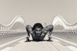 © Scopio - Grayscale photo of man doing press-ups