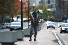 Man Walking In Street