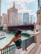 © Scopio - Woman standing by river, chicago, usa