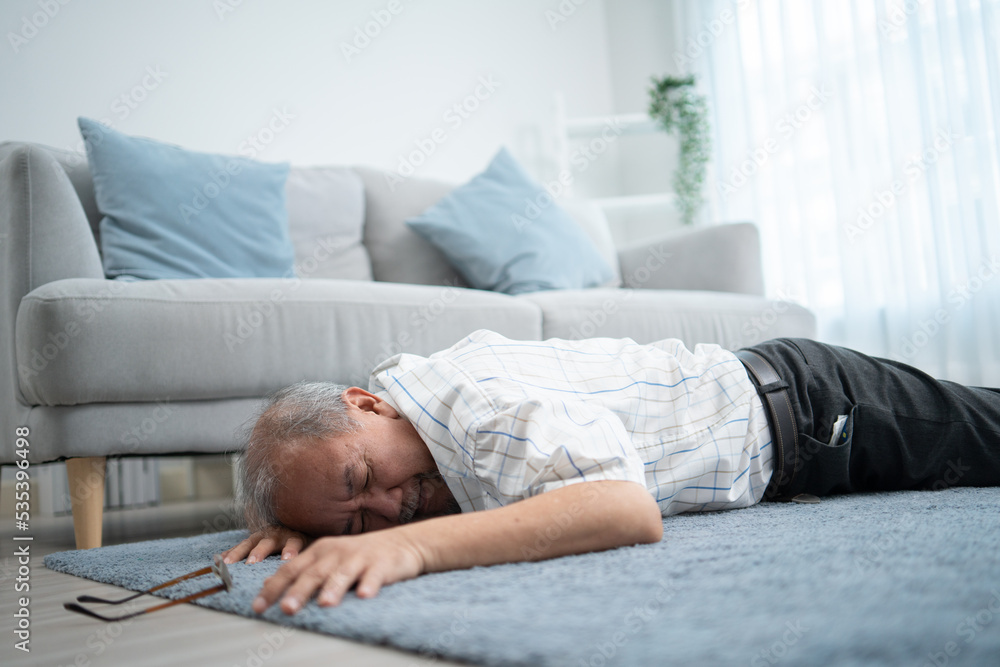 Asian senior grandfather fainting and falling on the ground in the ...