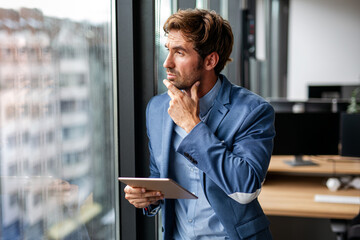 Wall Mural - Portrait of frustrated stressed business man working in corporate office