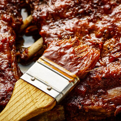 Poster - American style pork ribs marinated in barbecue sauce and glazed with honey and bbq souce.